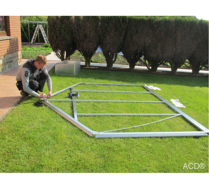 Montage d'une serre de jardin en verre par ACD